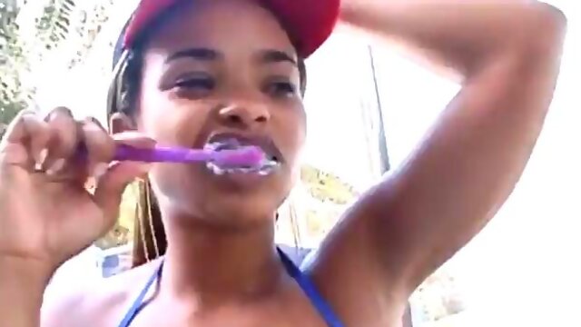 Naughty brushing the teeth with gala