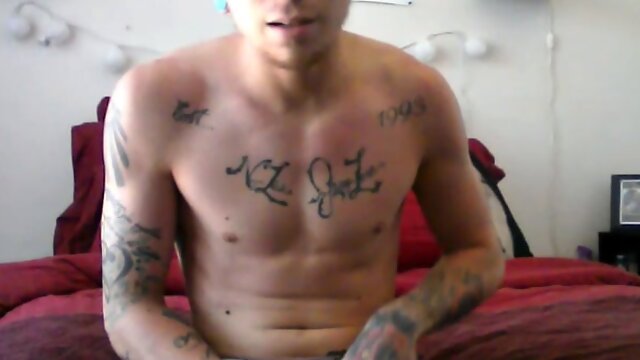 Robbie Callahan is an exhibitionist, and really gets into stroke shows. With all those tattoos, hes definitely got the bad boy look going on and we get to see his body art, as the camera moves in close, while he gets naked.