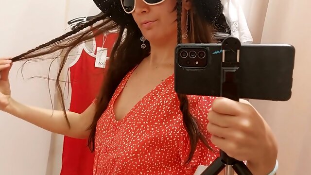 Amateur brunette tries on clothes in the fitting room. fur covered pussy, thick tits and big nips.