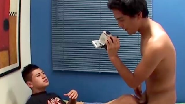 Latin boys Bernard and Ronald have a handheld camera out filming as they have fun playing with each other. Slowly the clothes come off, some dick sucking and ass licking get them hard