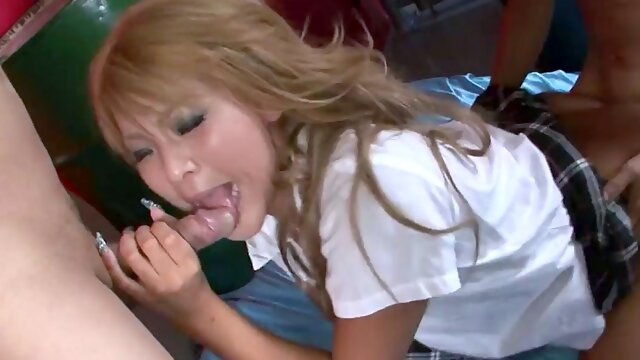 Horny Rina Umemiya Squirms as two Guys Give Her a Creampie