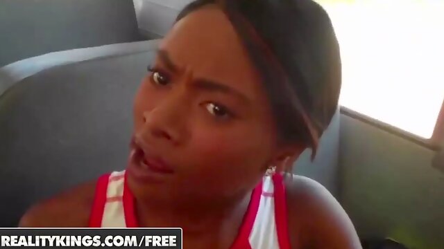 Black cheerleaders in uniform blow and eat on the bus - realitykings