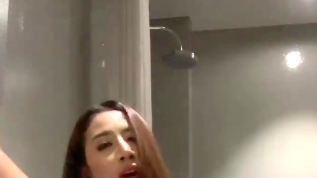 Buxom India has fun with her favorite dildo in the bathroom!