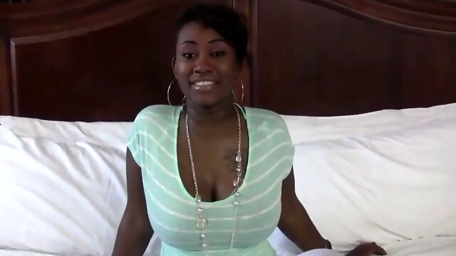 Huge boobed black whore sucking