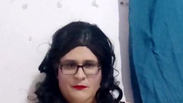 Solo crossdresser in couch