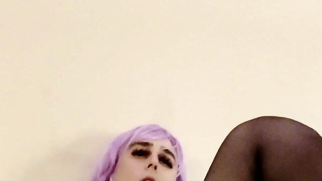 Sissy plays with big dildo