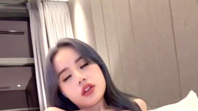 Chinese female with luxurious tats blasting while toying with herself