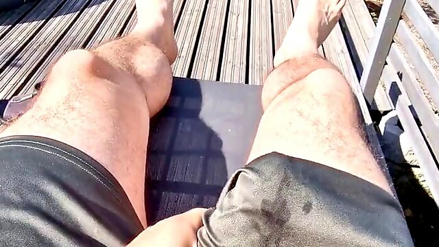 Sunbathing with stiff rod. I think my neighbor is witnessing me