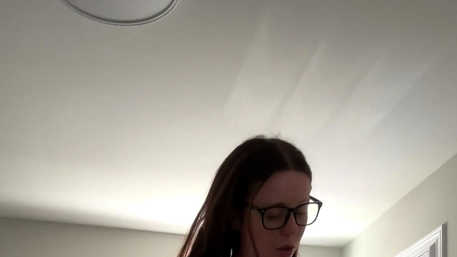 Housewife Has a Little Break After Tidying the Guest Room