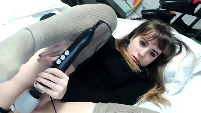 Brunette milf in stockings masturbating by dildo on webcam