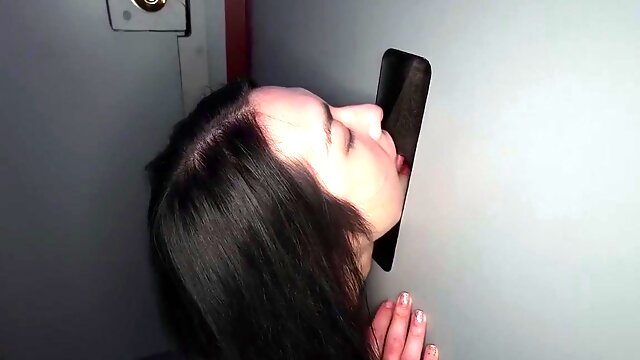 Wild babe sucking and fucking multiple cocks gloryhole style