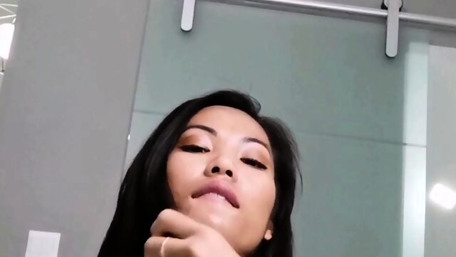 Close up with asian maiden giving blowjob