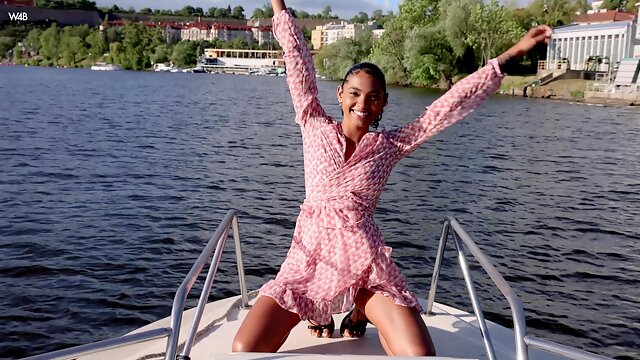 Sexy ebony girl masturbates in a yacht cabin. She teases her clit and moans in pleasure