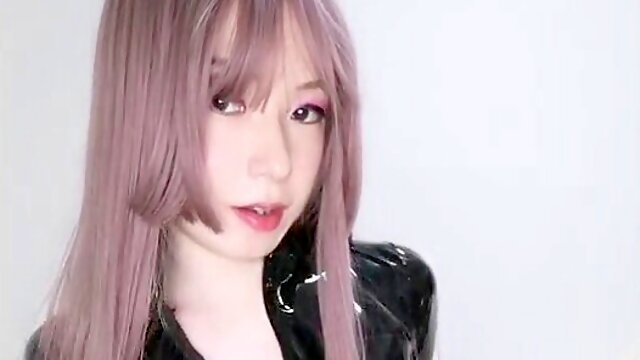 Crossdresser in latex videos