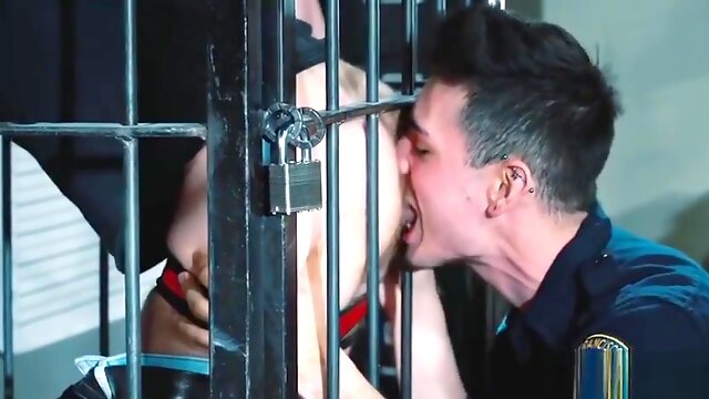 Prisoner Pulling His Jeans Down For The Officer On Duty