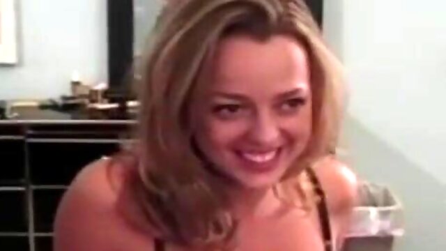 Bigtitted retro babe showing off pierced clit