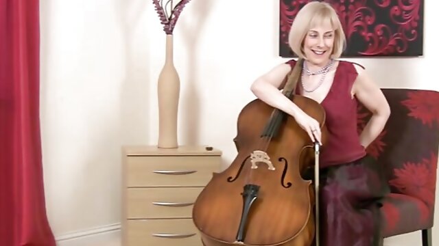 Slender mature retro lady hotly undresses and masturbates hairy pussy