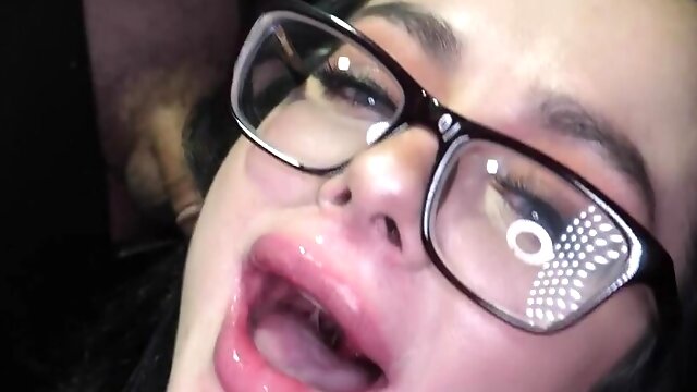 Brunette milf Macey Jade gets a hot facial through the gloryhole.