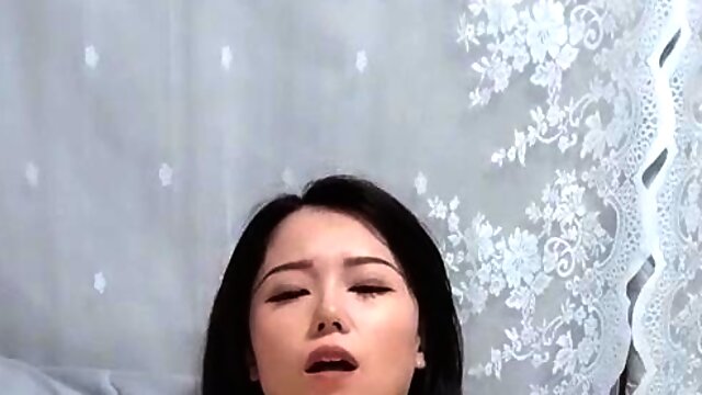 Japanese teen has her trimmed pussy toyed