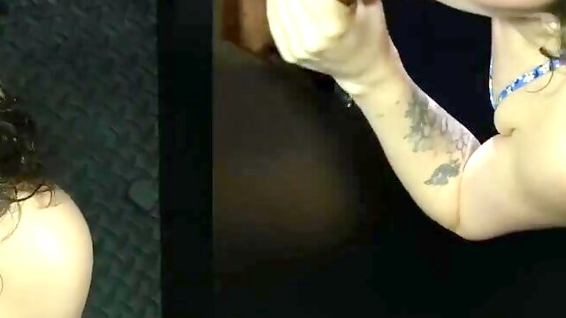 Petite Hazel Paige, with her 411 frame, sucks a big black cock through a gloryhole.