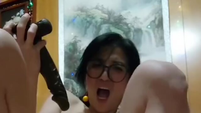 Skinny Asian MILF Squirts Like Crazy While DP-ing Her Stretched Holes With Huge Dildos