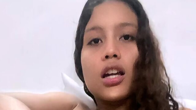 Petite latina girl gently fingers her pussy, teasing her viewers
