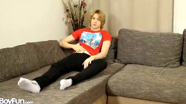 Johannes Lars moans as he jerks off with legs spread