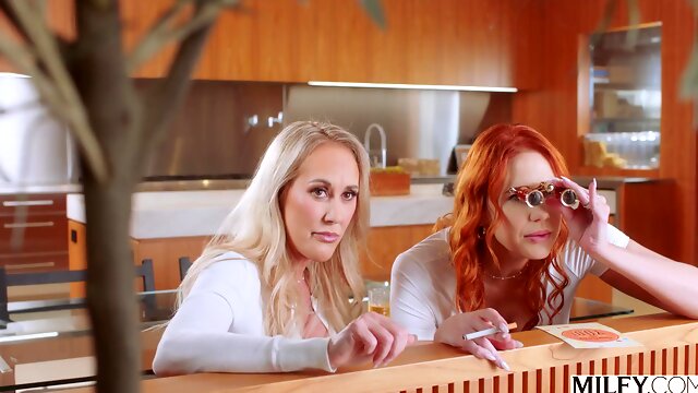 Redhead MILF and her BF share a BBC