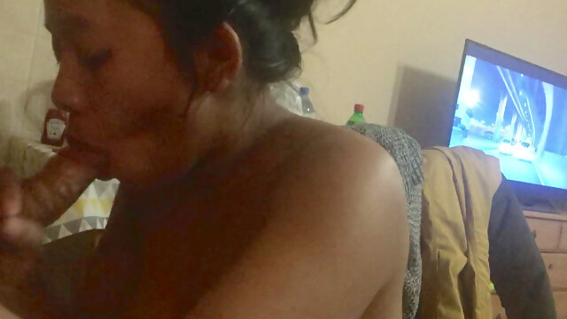 Indonesian on Her Knees Suck Dick