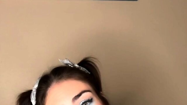 Cute college girl plays with her lovenestle doll