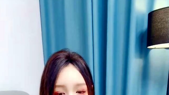 Busty Japanese babe in lingerie has her pussy licked out