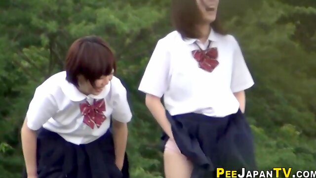 Kinky asian teens pissing in public