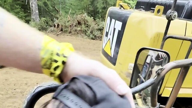 Pigtailed busty slut provides blowjob service outdoors