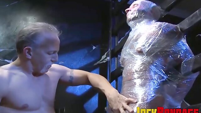 Drake Jaden has been drained of his cum while being wrapped in plastic wrap