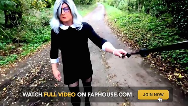 Amateur crossdresser Kellycd2022 in black dress and pantyhose outdoors