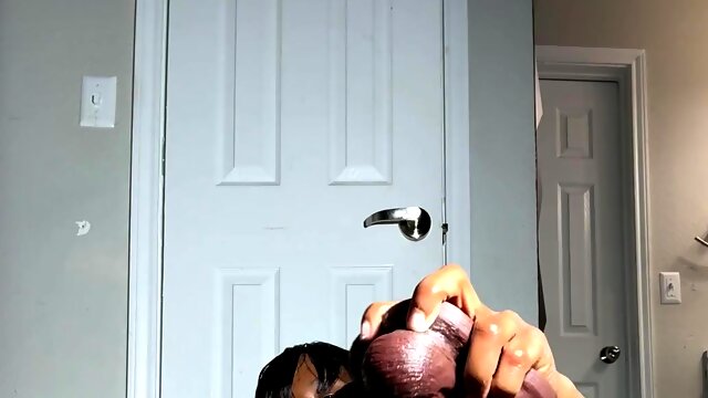 Horny ebony chick with an outstanding big butt masturbates with huge toy