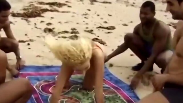 Beautiful and hot blonde with a big tail moaning and cumming, giving her pussy and very tasty spit on the beach: Porn