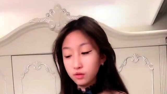 Hot Japanese Teen Removes Her Bra And Masturbates