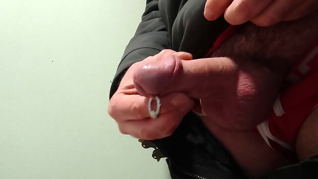 Getting off and cumshot in a condom at work.