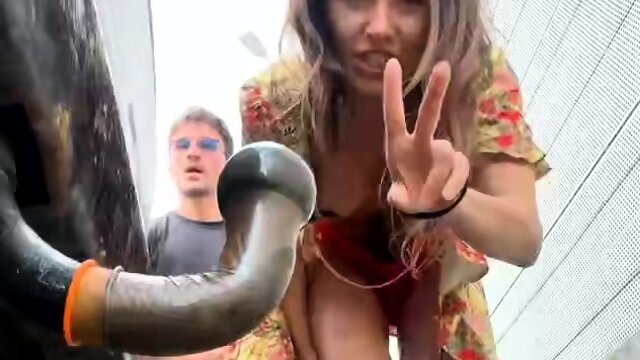 Busty MILF in Red Boots Sucks Truck Pipe in Public