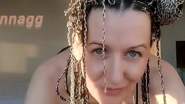 Long-haired woman dominates the camera with hairy armpits and bold self-worship