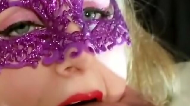 Masked blonde swallows load after deepthroat, licks lips with cigarette in hand