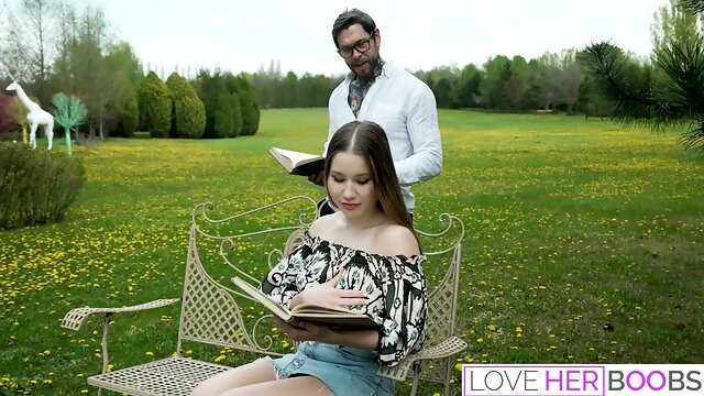 Dean Van Damme enjoys a passionate titjob from a brunette with huge tits in a sunlit modern lounge