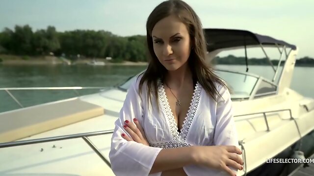 Tina Kay indulges in foot fetish play before mounting her lover on a sunlit boat
