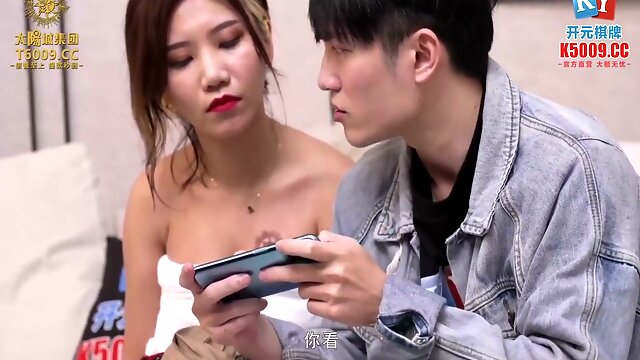 Young Asian couple shares intimate moments in a sleek modern apartment