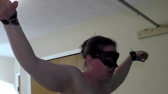 Submissive husband restrained and blindfolded after stepping out of line