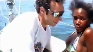 After a ride of boat he wants to fuck his friends black ass on a desert beach