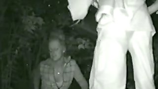 Candid night video of a skinny girl peeing in the bushes
