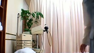 Japanese girl fucked in front of hidden cameras in a massage parlor