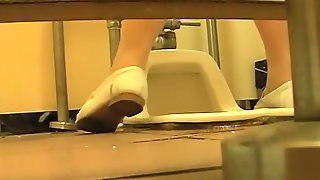 Office girls are pissing in the womens WC